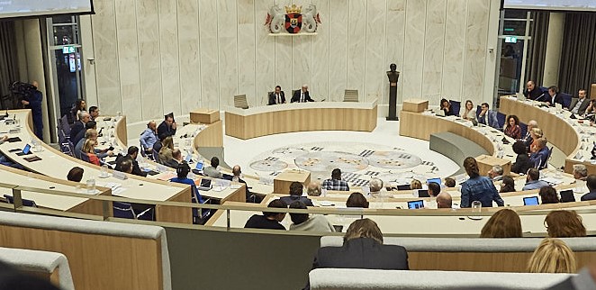 politieke markt, debat voorrand statushouders